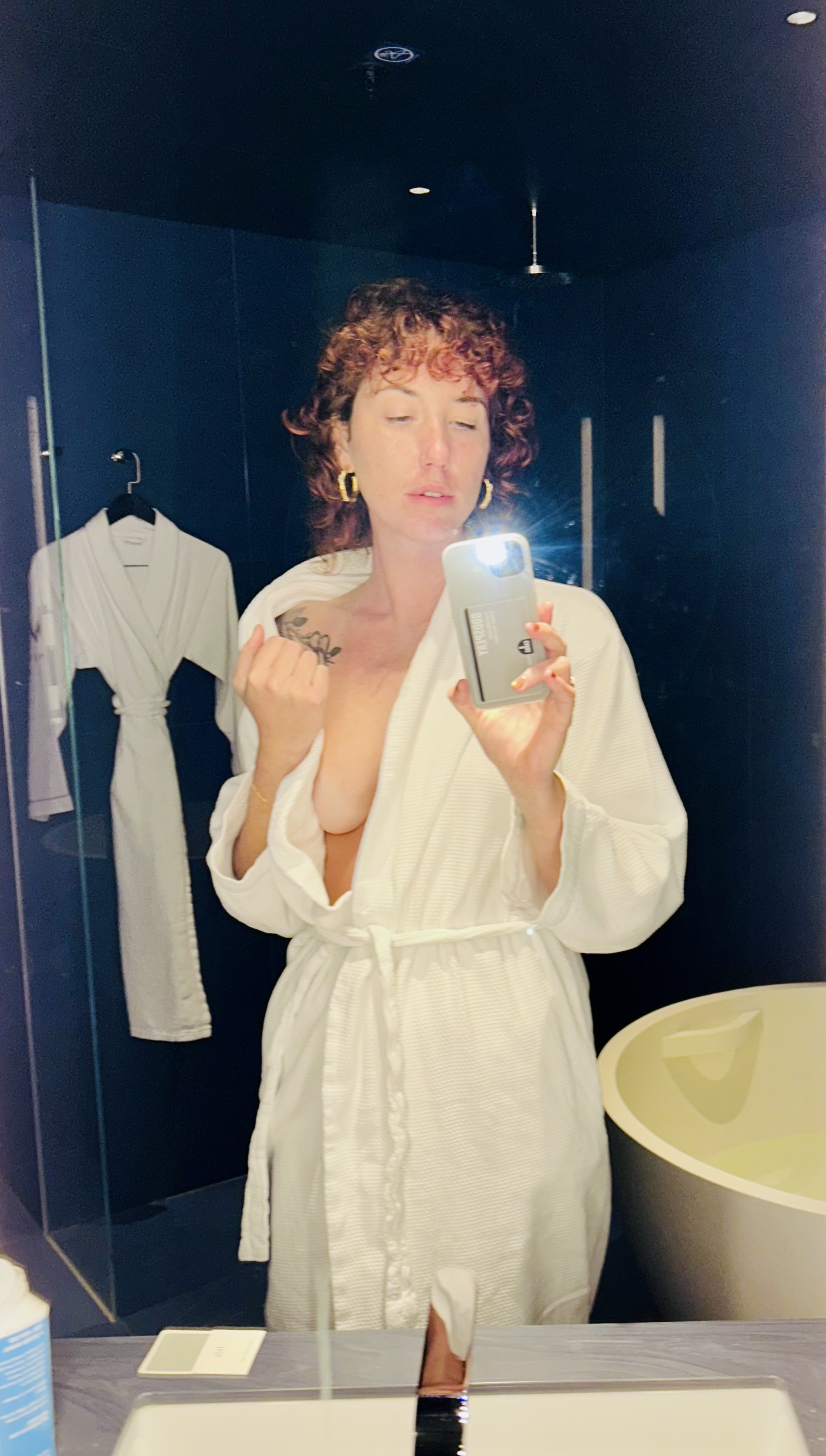 Mirror portrait in a white robe